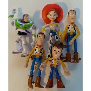5 Toy Story Action Figures including a talking Woody, 2 Woodys from other Toy St